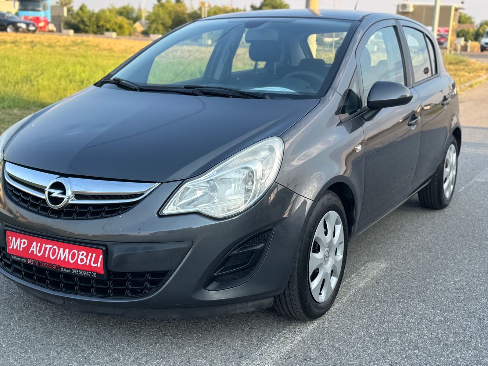 Opel Corsa 1,3 CDTI-2012gd.md-KLIMA-5vrata,tempomat,1.vlasnica,KARTICE, fotografija 2