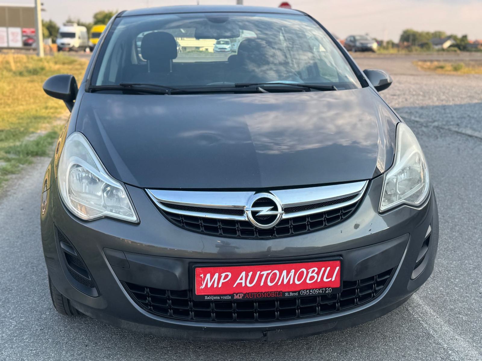 Opel Corsa 1,3 CDTI-2012gd.md-KLIMA-5vrata,tempomat,1.vlasnica,KARTICE, fotografija 5