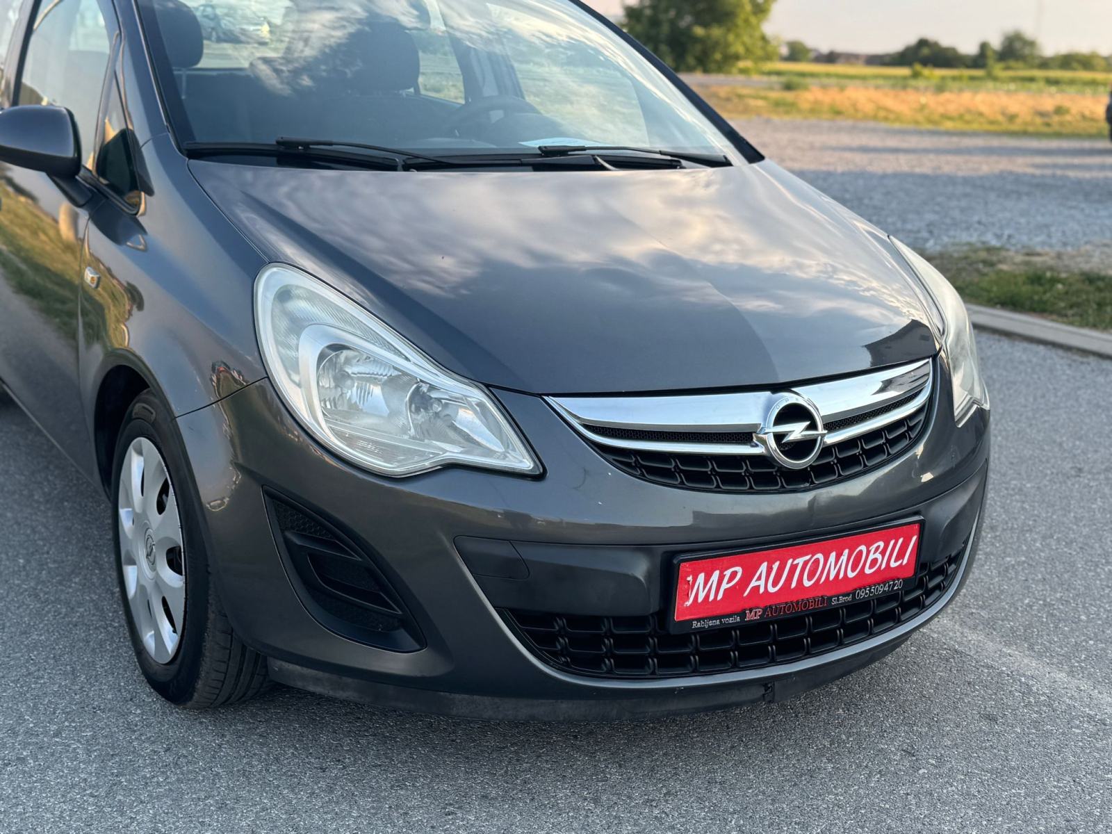 Opel Corsa 1,3 CDTI-2012gd.md-KLIMA-5vrata,tempomat,1.vlasnica,KARTICE, fotografija 6