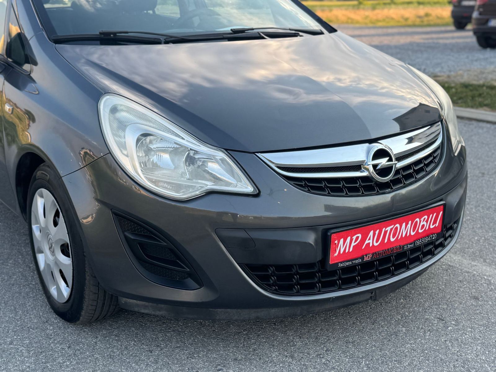 Opel Corsa 1,3 CDTI-2012gd.md-KLIMA-5vrata,tempomat,1.vlasnica,KARTICE, fotografija 7