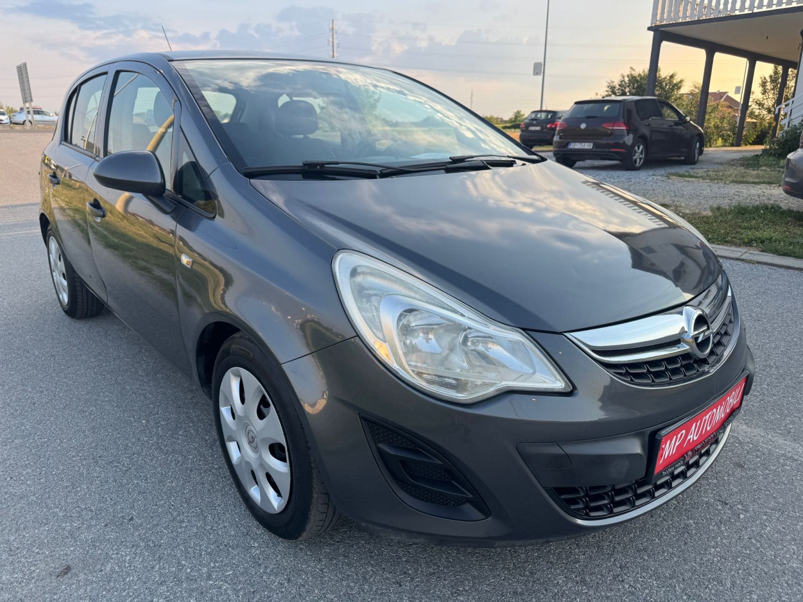 Opel Corsa 1,3 CDTI-2012gd.md-KLIMA-5vrata,tempomat,1.vlasnica,KARTICE, fotografija 8