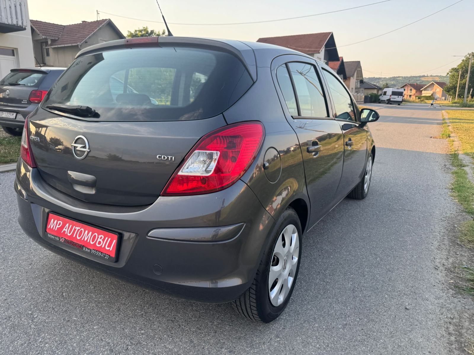 Opel Corsa 1,3 CDTI-2012gd.md-KLIMA-5vrata,tempomat,1.vlasnica,KARTICE, fotografija 10