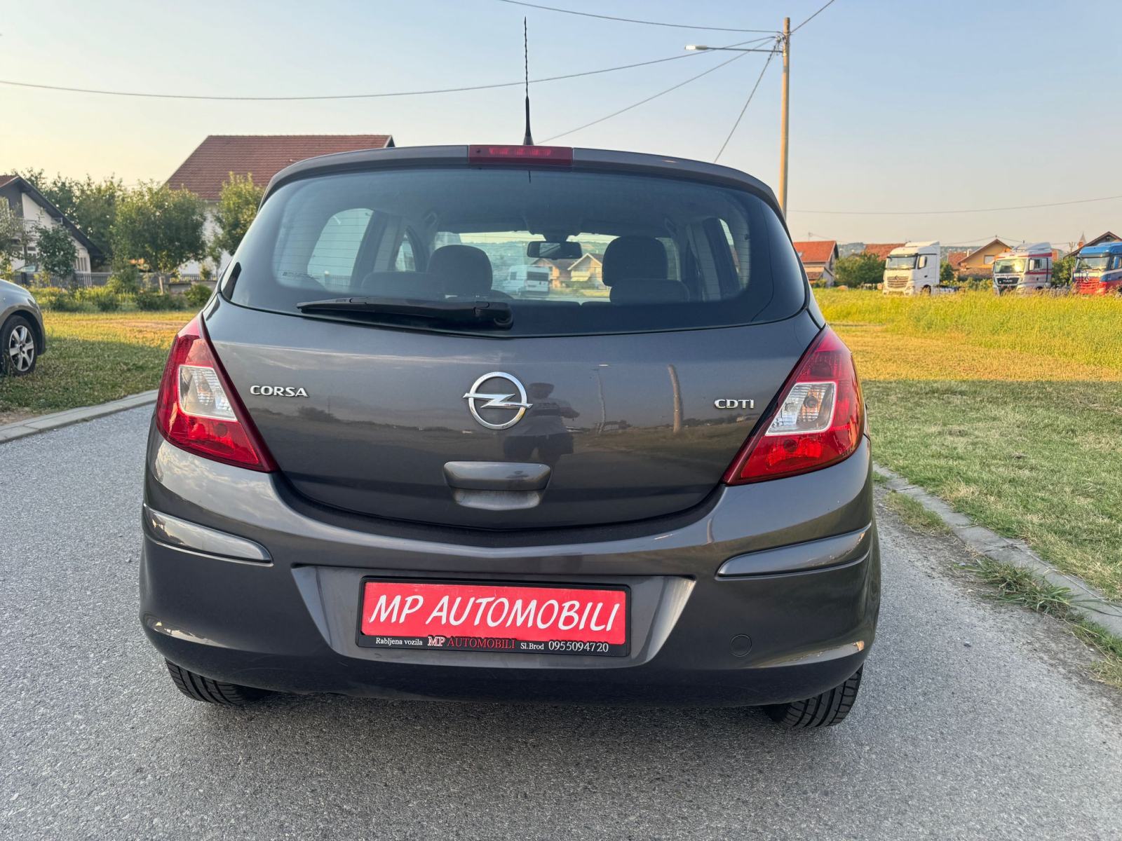 Opel Corsa 1,3 CDTI-2012gd.md-KLIMA-5vrata,tempomat,1.vlasnica,KARTICE, fotografija 11