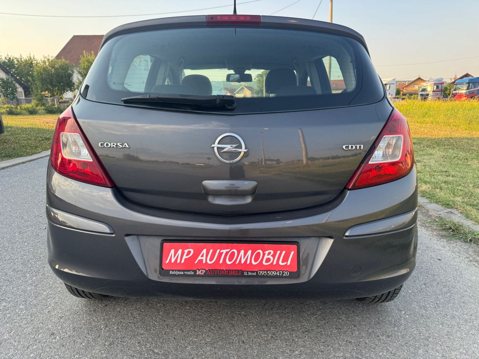 Opel Corsa 1,3 CDTI-2012gd.md-KLIMA-5vrata,tempomat,1.vlasnica,KARTICE, fotografija 12