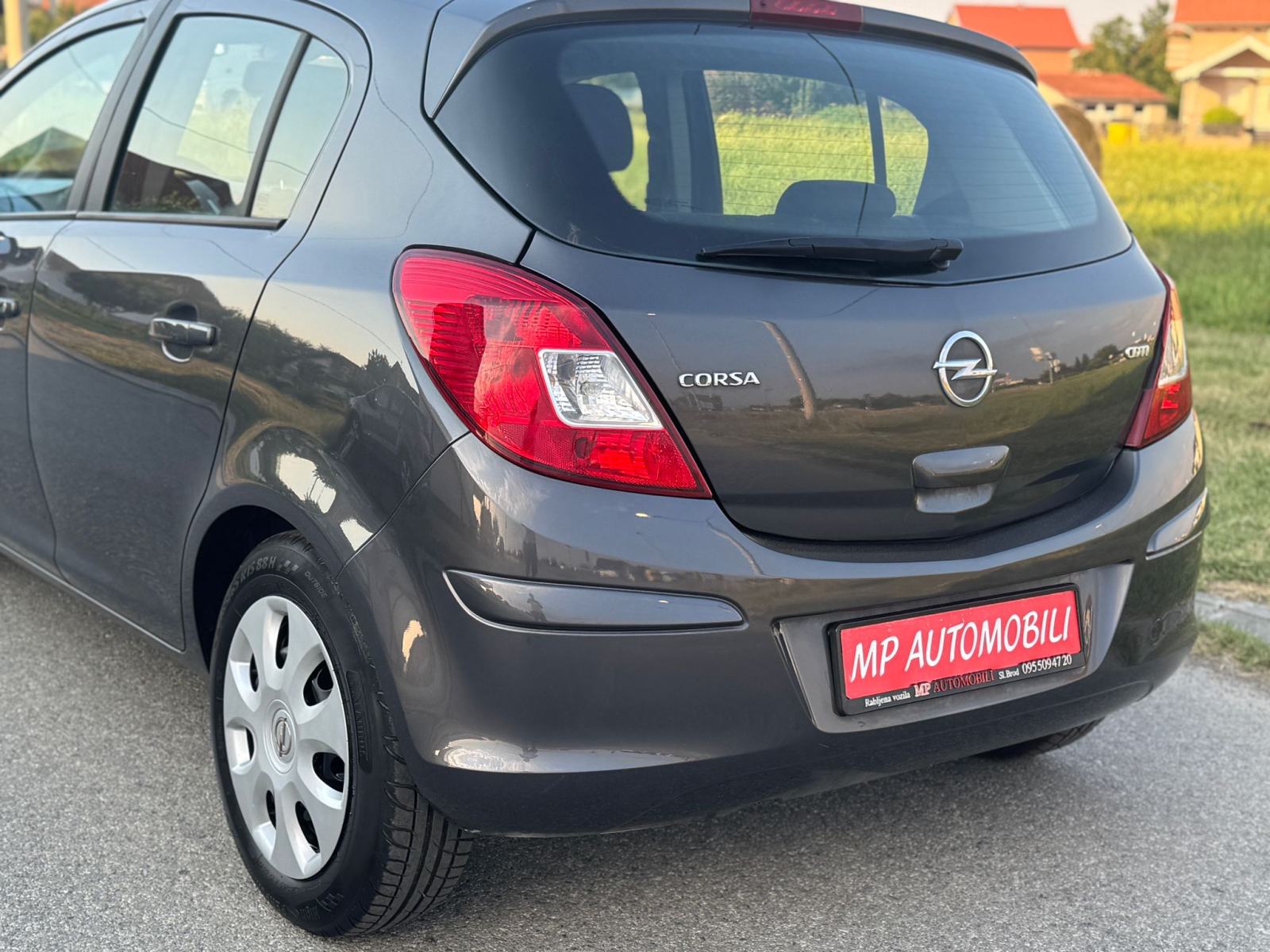 Opel Corsa 1,3 CDTI-2012gd.md-KLIMA-5vrata,tempomat,1.vlasnica,KARTICE, fotografija 13