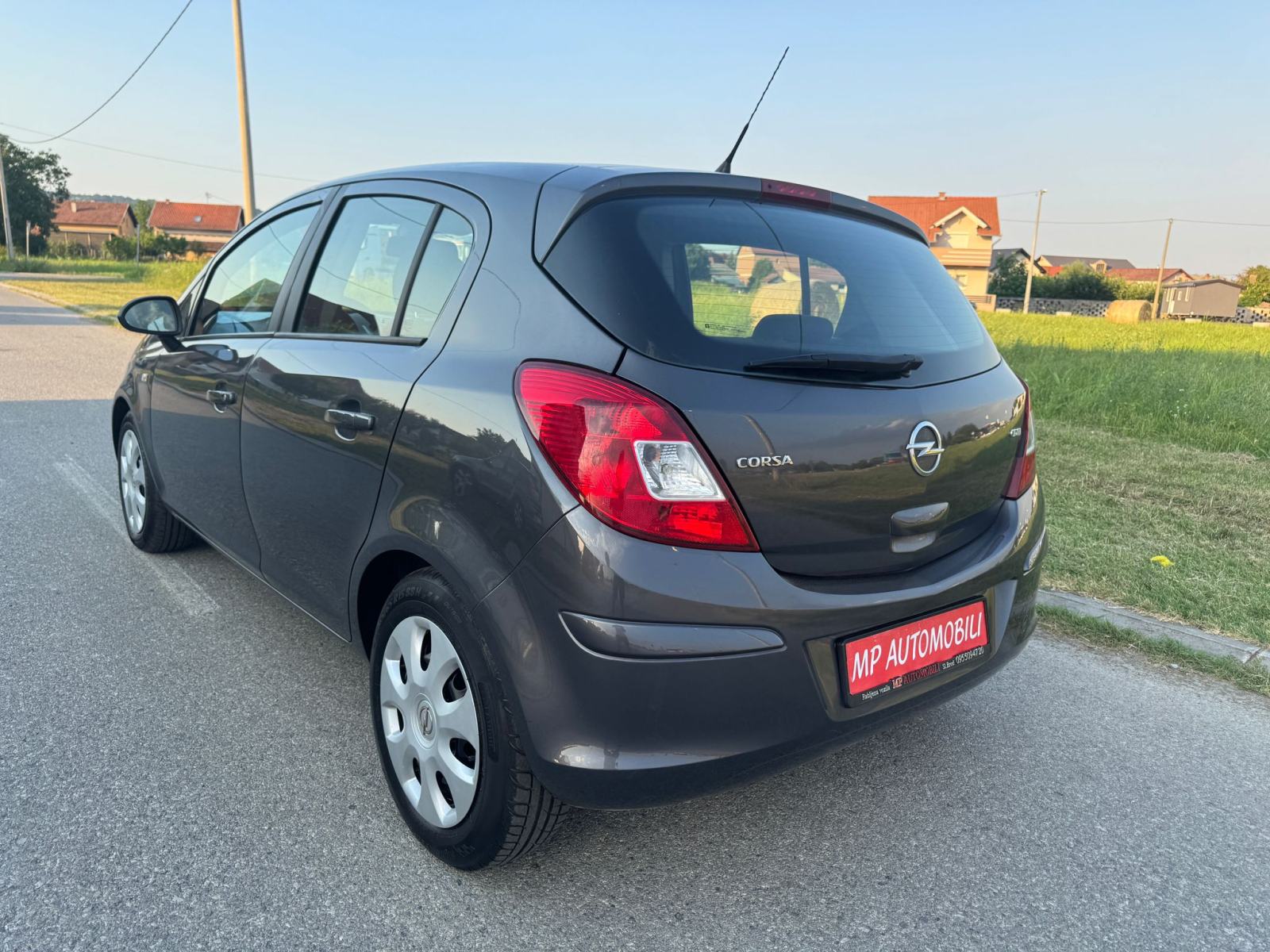 Opel Corsa 1,3 CDTI-2012gd.md-KLIMA-5vrata,tempomat,1.vlasnica,KARTICE, fotografija 14