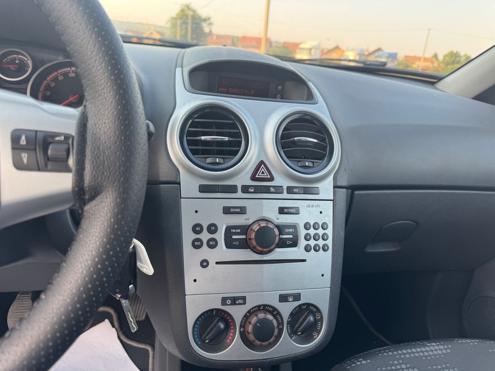 Opel Corsa 1,3 CDTI-2012gd.md-KLIMA-5vrata,tempomat,1.vlasnica,KARTICE, fotografija 17