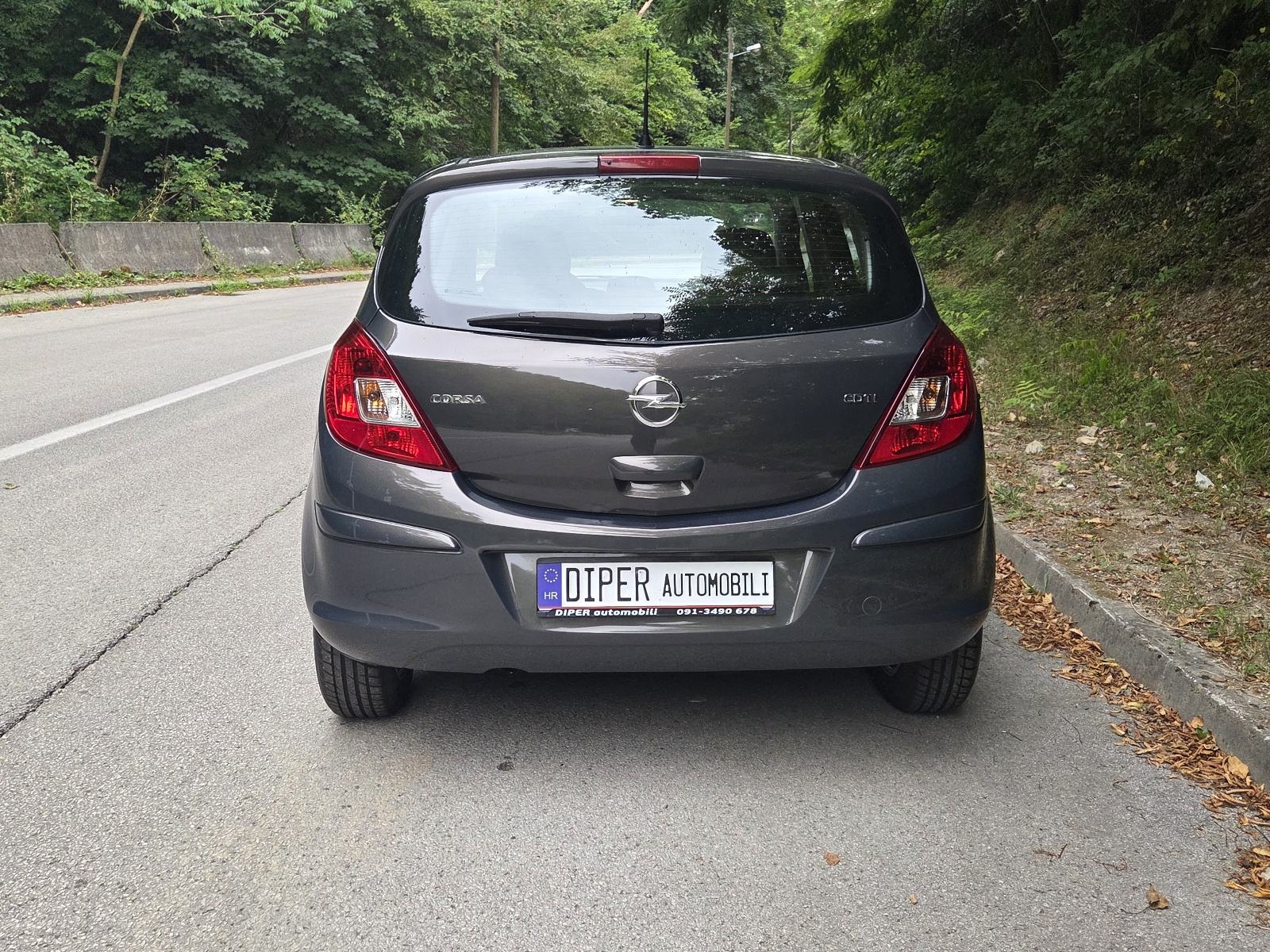 OPEL CORSA 1,3 cdti TEMPOMAT KOŽA ALU FELGE, fotografija 8