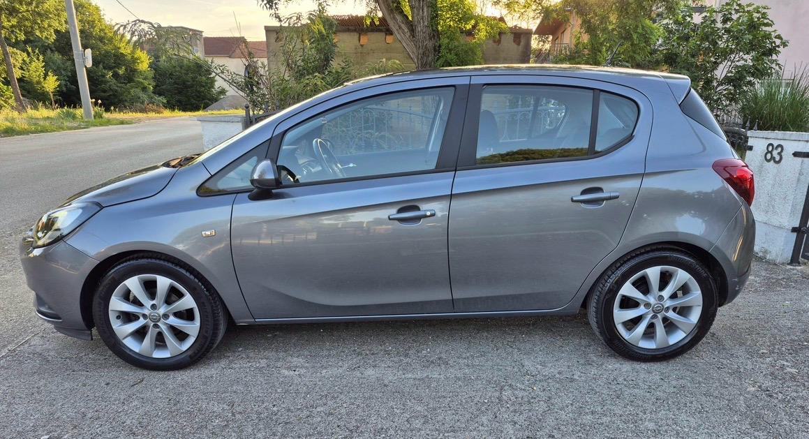 Opel Corsa 1,4 / 77.250 km / servisna knjiga / 5 vrata, fotografija 4