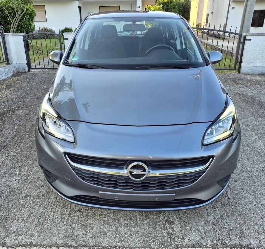 Opel Corsa 1,4 / 77.250 km / servisna knjiga / 5 vrata, fotografija 2
