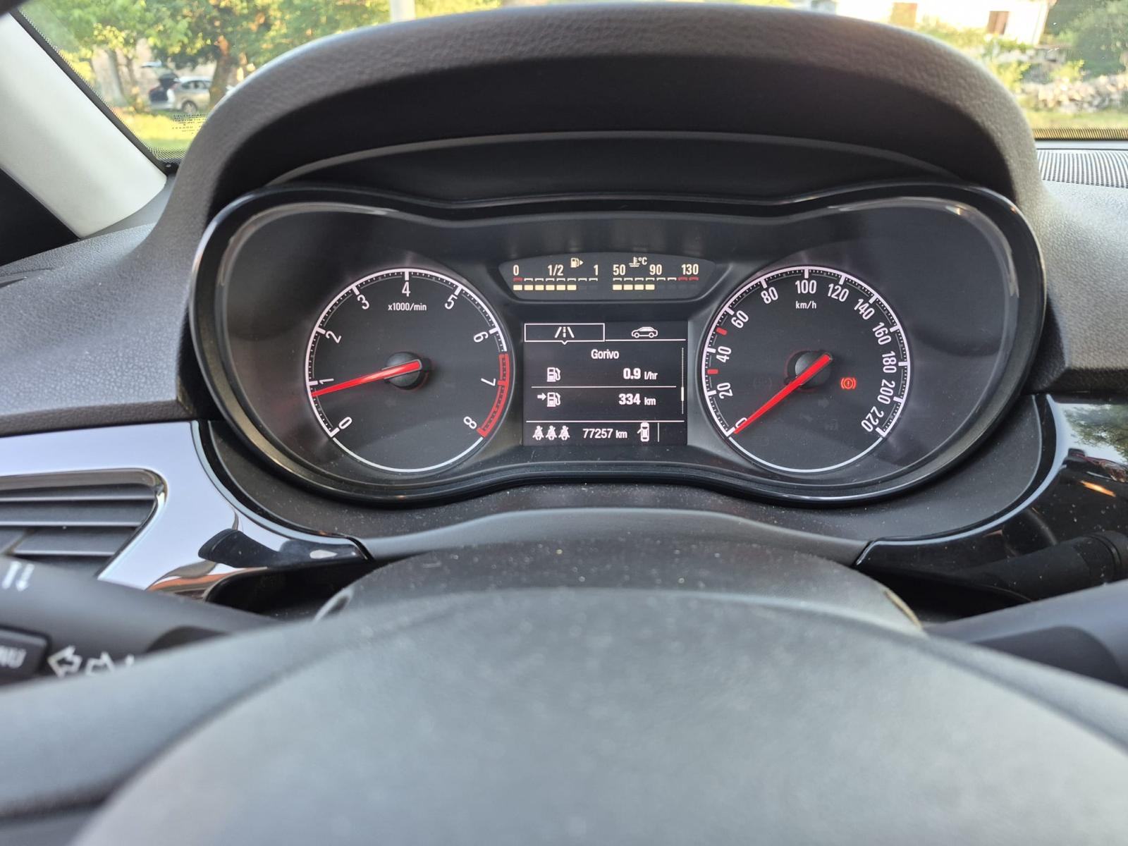 Opel Corsa 1,4 / 77.250 km / servisna knjiga / 5 vrata, fotografija 15
