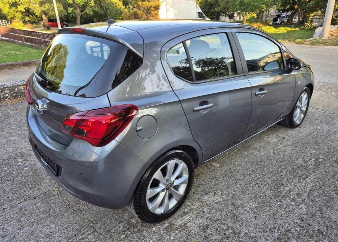 Opel Corsa 1,4 / 77.250 km / servisna knjiga / 5 vrata, fotografija 6