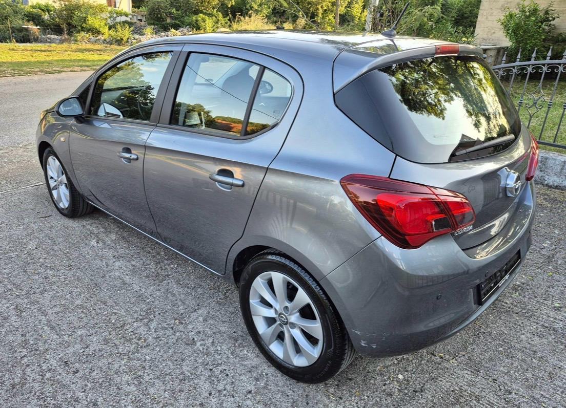 Opel Corsa 1,4 / 77.250 km / servisna knjiga / 5 vrata, fotografija 8