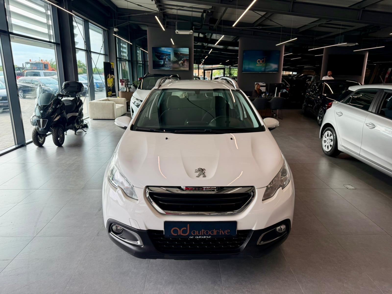 Peugeot 2008 1,2 KLIMA • VELIKI SERVIS • ALU 16" • AUTOKREDIT, fotografija 3