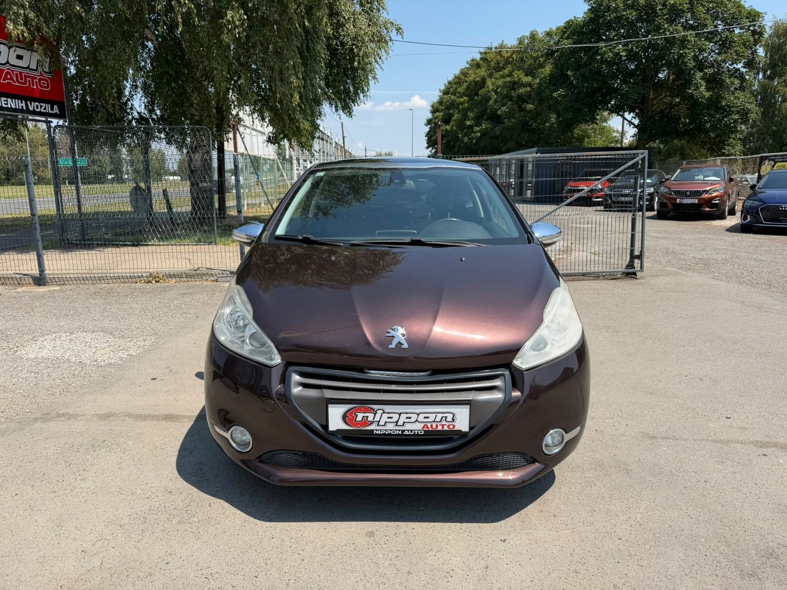 Peugeot 208 1,6 e-HDi - NAVI - KLIMA - TEMPOMAT - REGISTRIRAN, fotografija 2