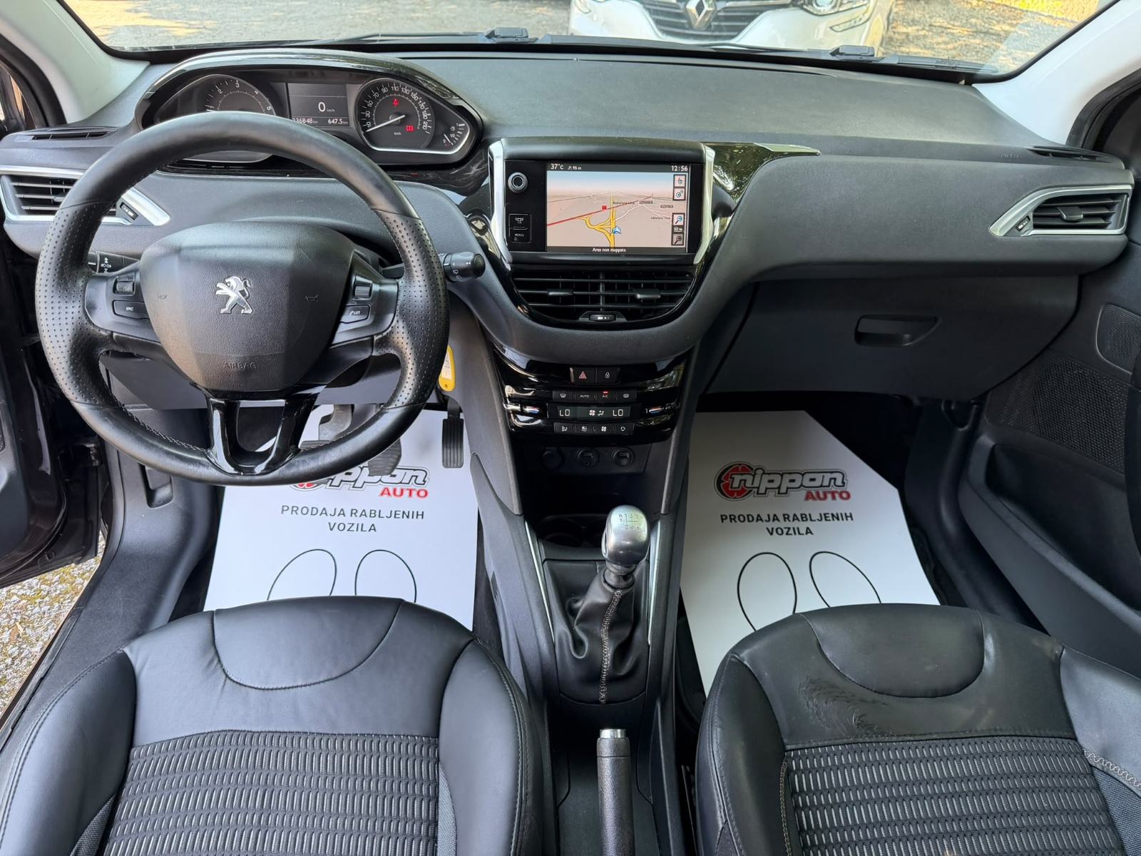 Peugeot 208 1,6 e-HDi - NAVI - KLIMA - TEMPOMAT - REGISTRIRAN, fotografija 12