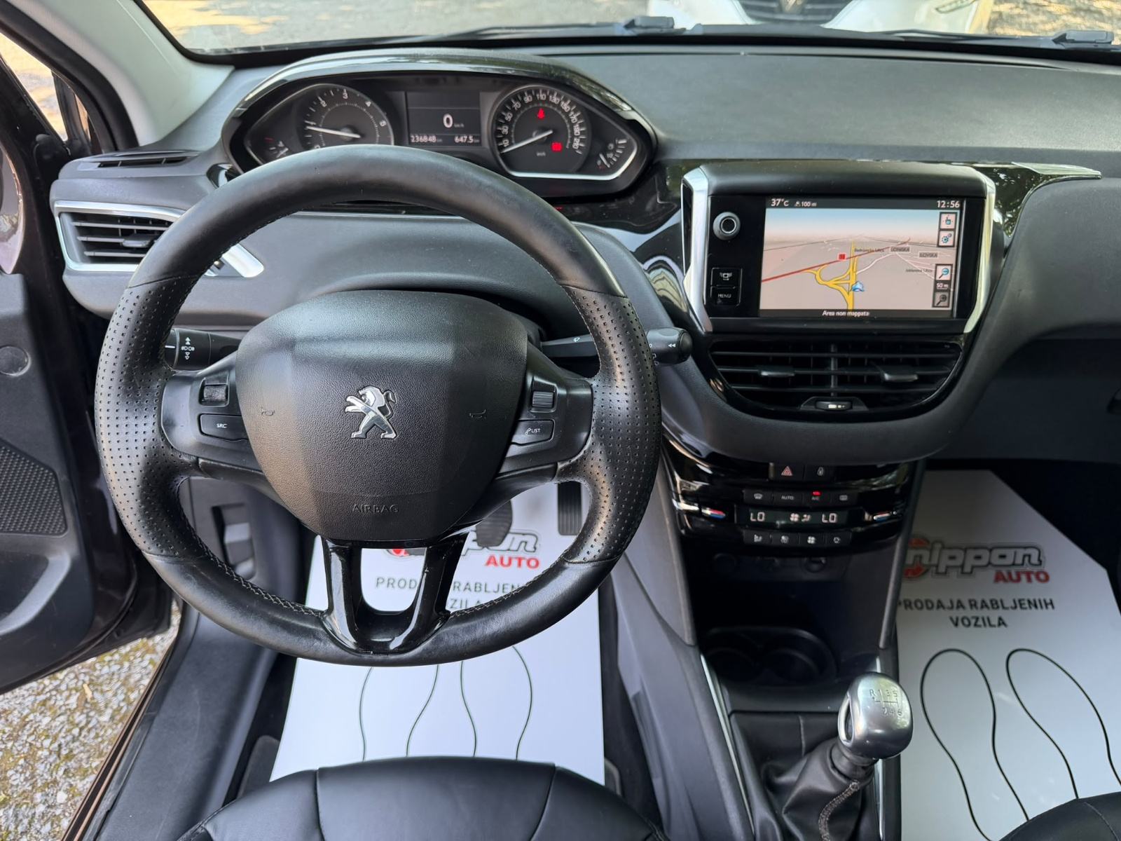 Peugeot 208 1,6 e-HDi - NAVI - KLIMA - TEMPOMAT - REGISTRIRAN, fotografija 13