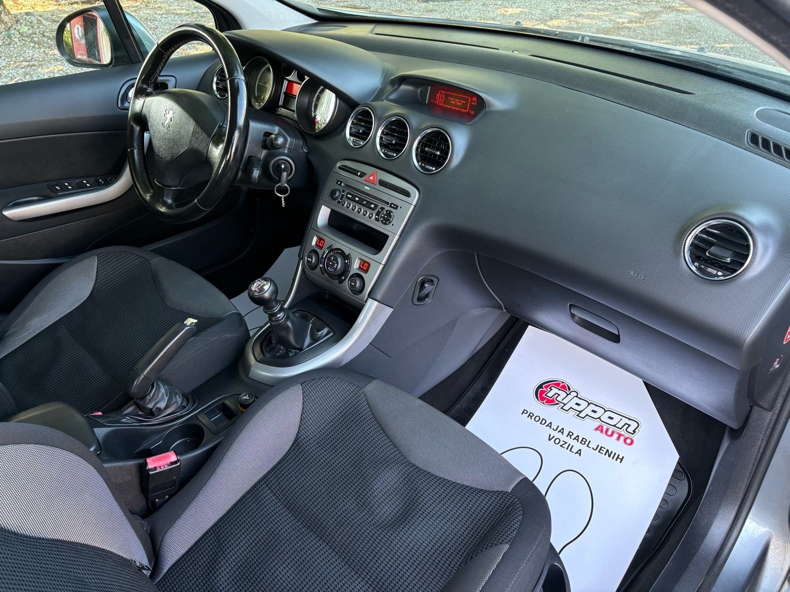 Peugeot 308 1,6 HDi KLIMA - ALU - VELIKI SERVIS - AUTOKREDIT, fotografija 18