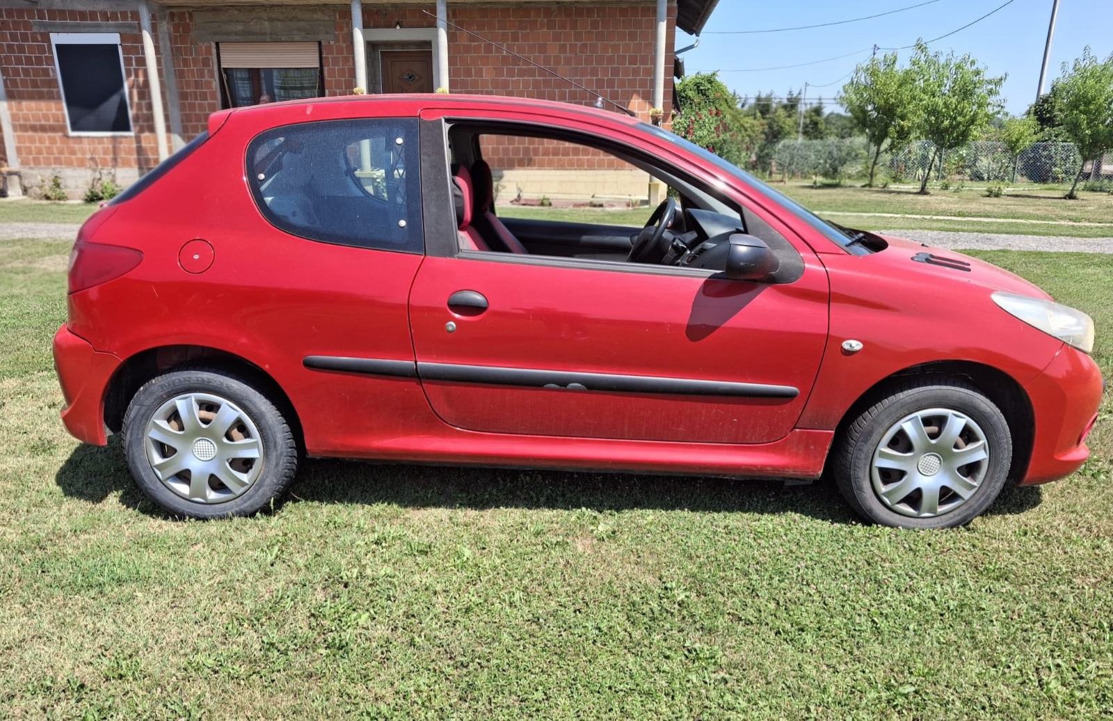 Peugeot 206+ 1,4 HDi 2011g, fotografija 5