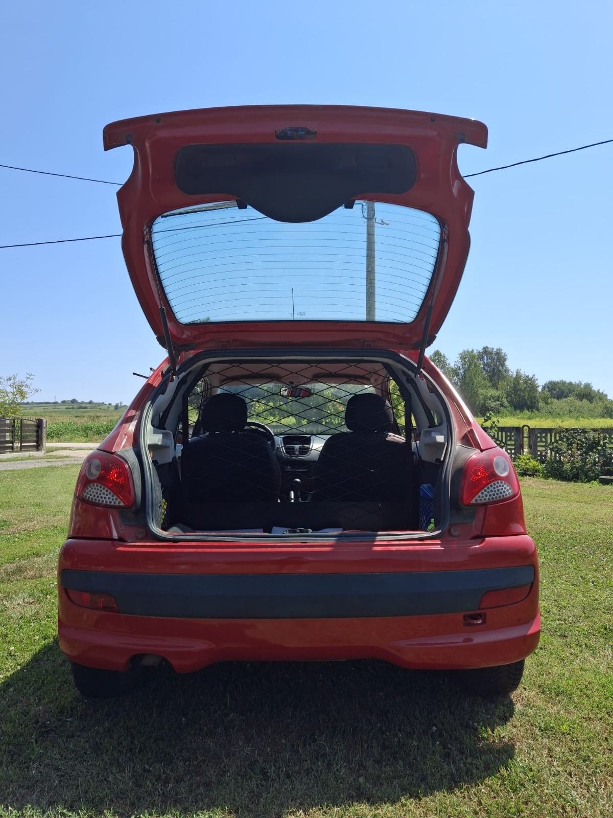 Peugeot 206+ 1,4 HDi 2011g, fotografija 10