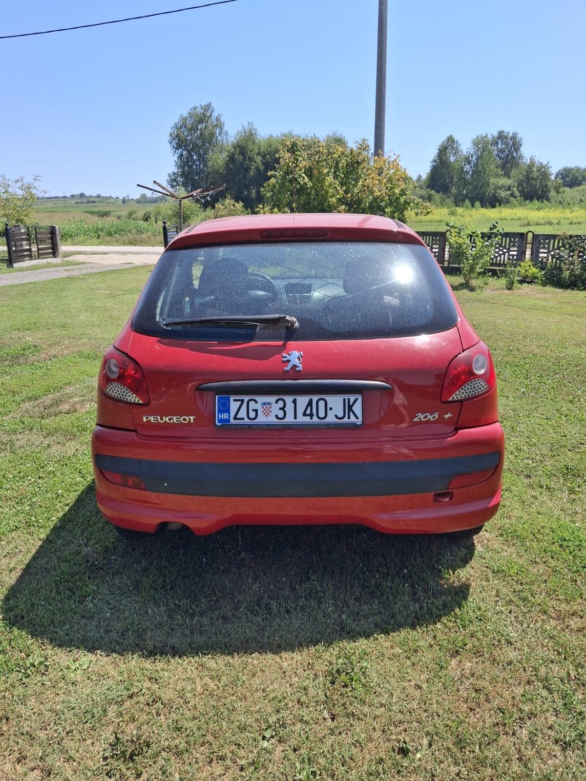 Peugeot 206+ 1,4 HDi 2011g, fotografija 9
