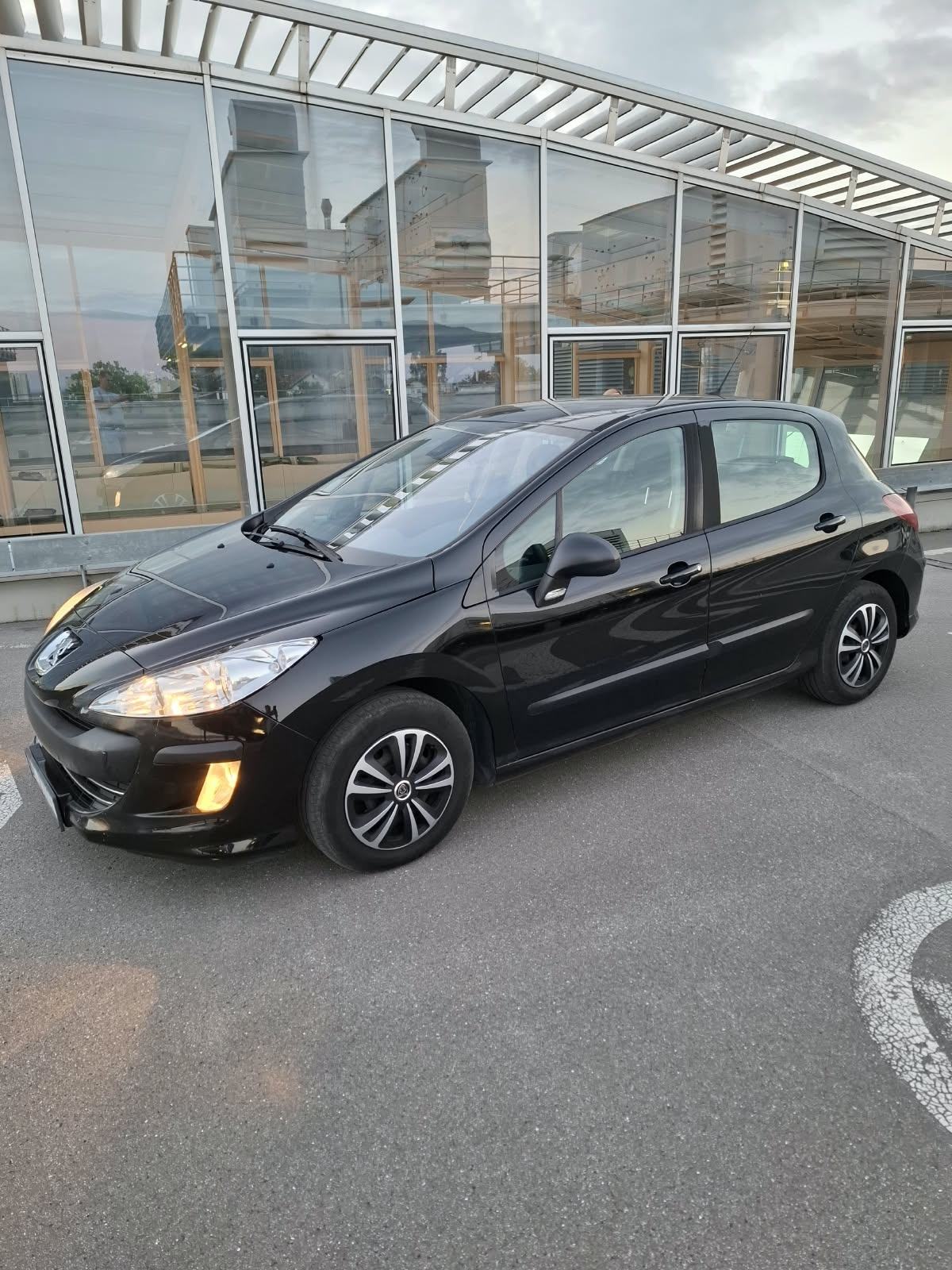 Peugeot 308 1,6 HDi, fotografija 12