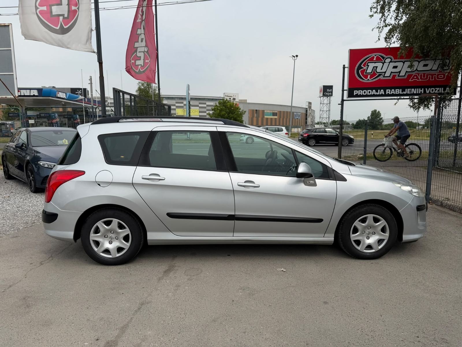 Peugeot 308 SW 1,6 HDi KLIMA - REGISTRIRAN - AUTOKREDIT, fotografija 7