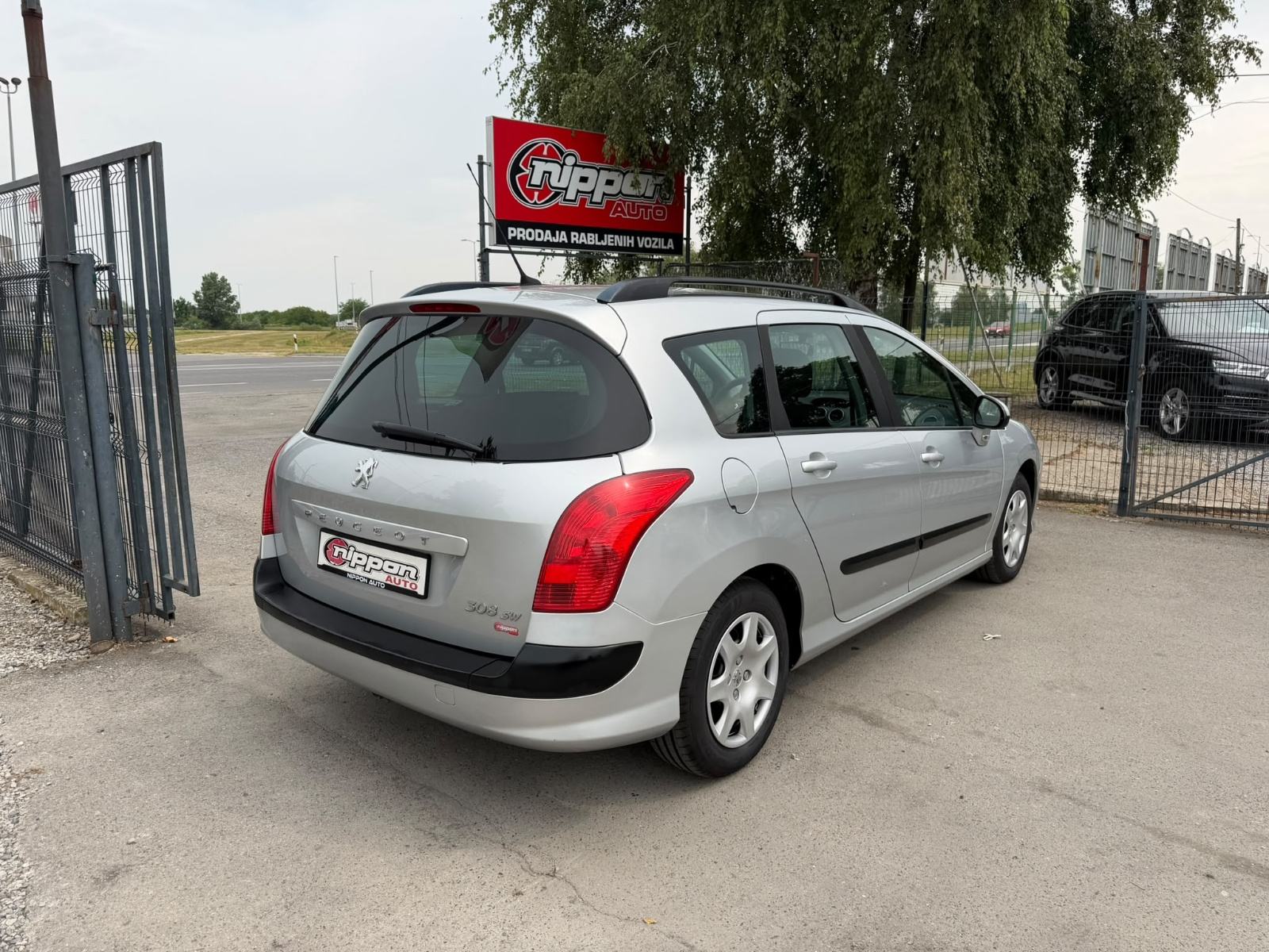 Peugeot 308 SW 1,6 HDi KLIMA - REGISTRIRAN - AUTOKREDIT, fotografija 6