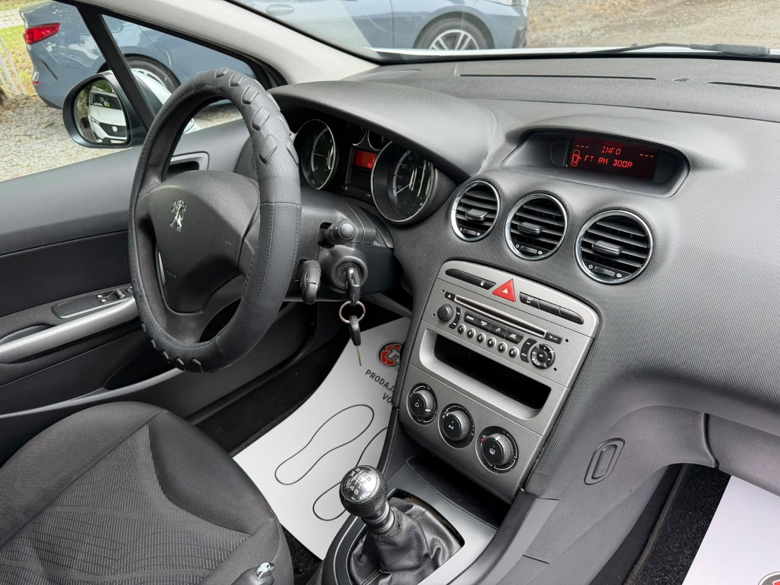 Peugeot 308 SW 1,6 HDi KLIMA - REGISTRIRAN - AUTOKREDIT, fotografija 17