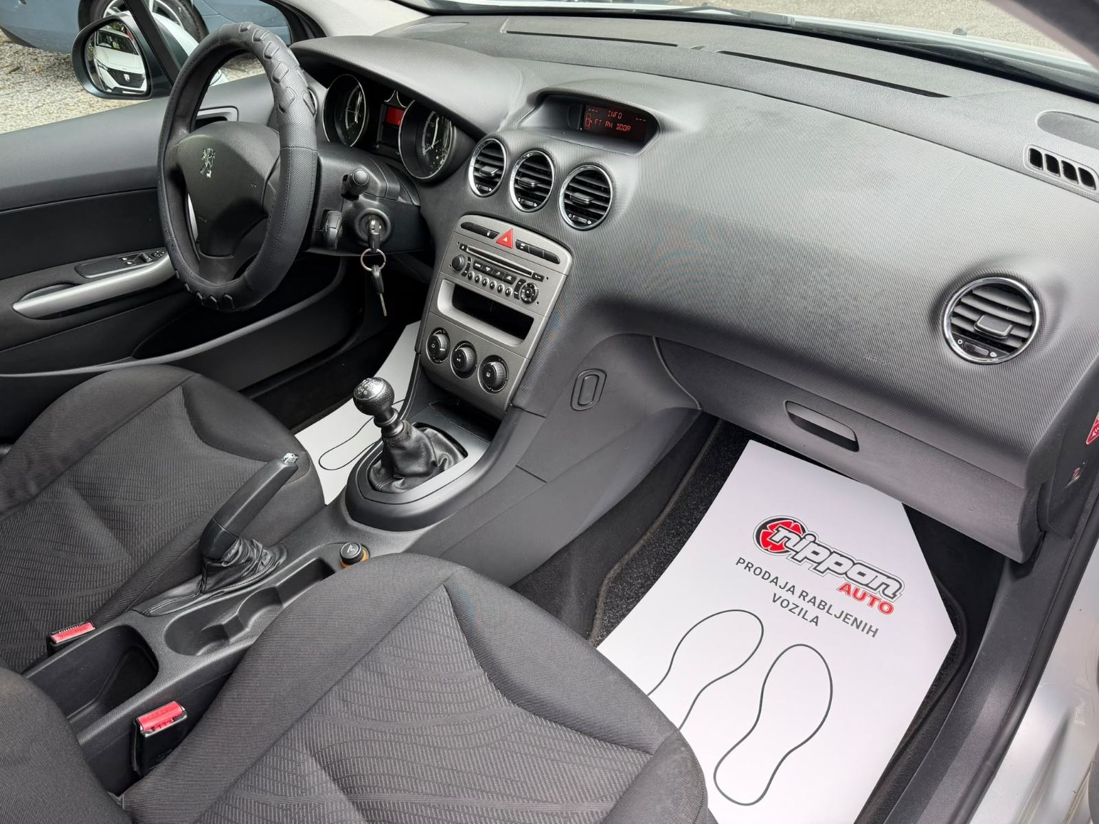 Peugeot 308 SW 1,6 HDi KLIMA - REGISTRIRAN - AUTOKREDIT, fotografija 18