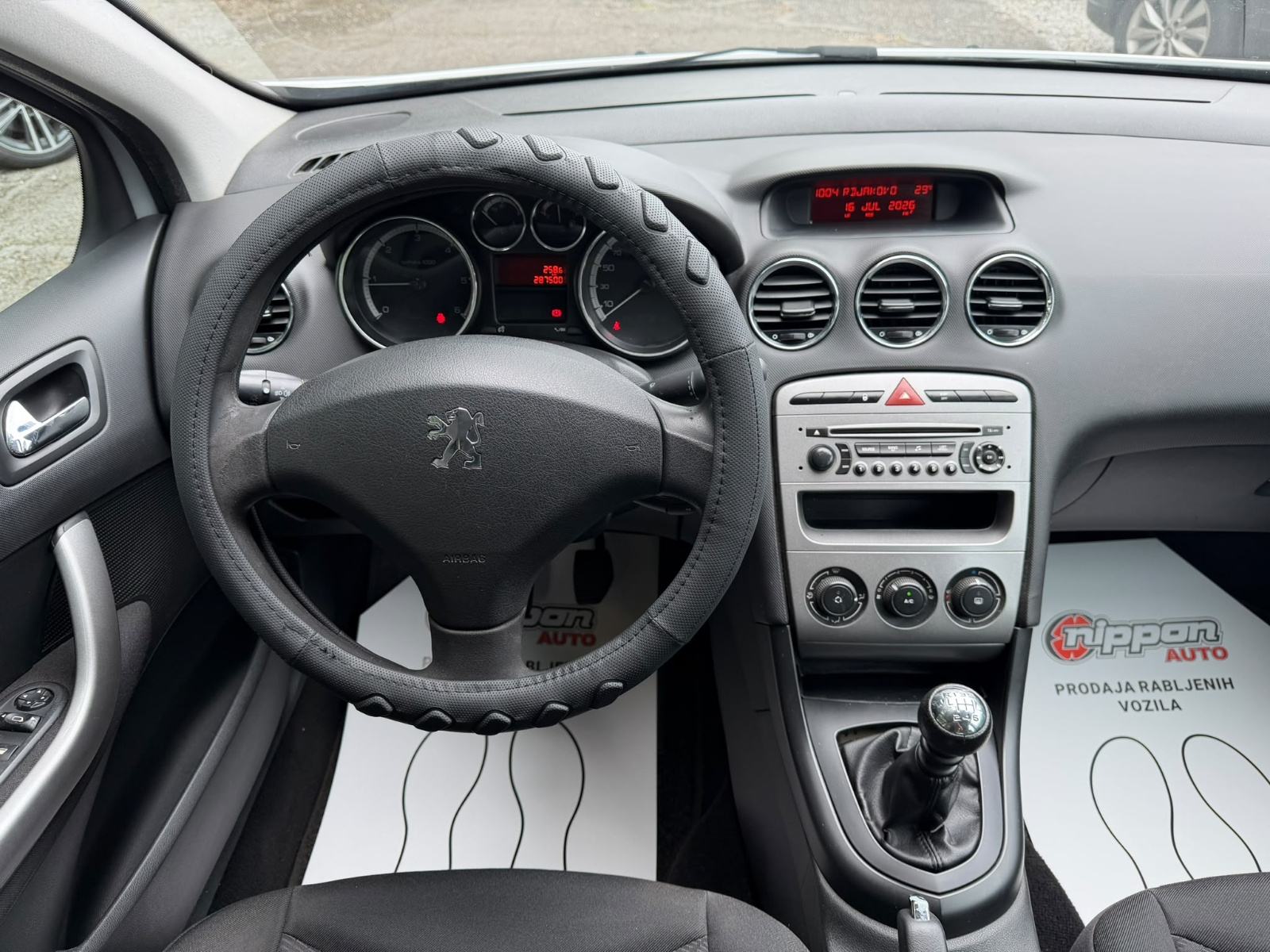 Peugeot 308 SW 1,6 HDi KLIMA - REGISTRIRAN - AUTOKREDIT, fotografija 13