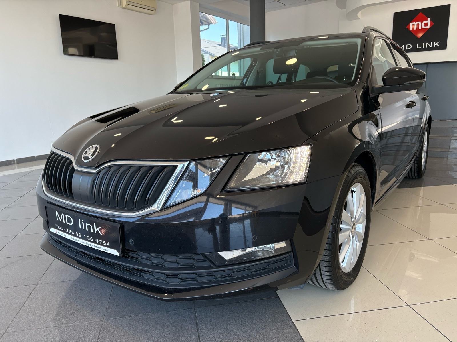Škoda Octavia Combi 1,6 TDI Ambition, fotografija 1