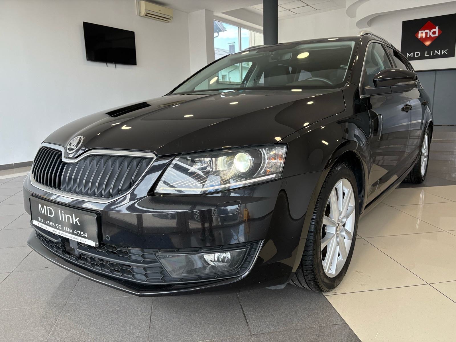 Škoda Octavia Combi 1,6 TDI Style, fotografija 14