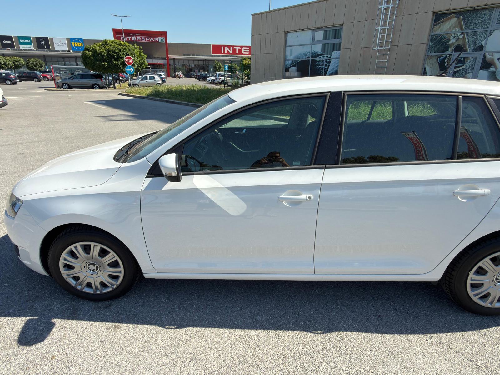 Škoda Rapid 1,0 TSI, fotografija 12
