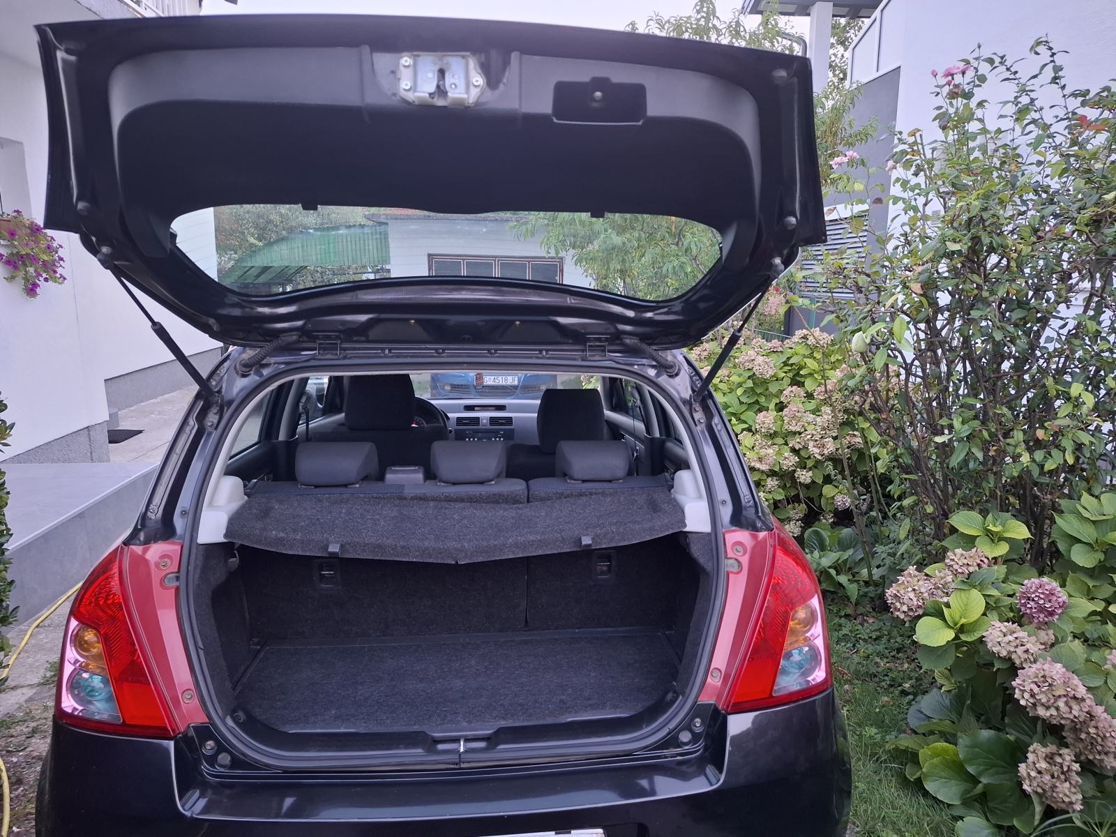 Suzuki Swift 1.3 i,POTVRDA O KM, REG. 8/2027. VRHUNSKI !, fotografija 14