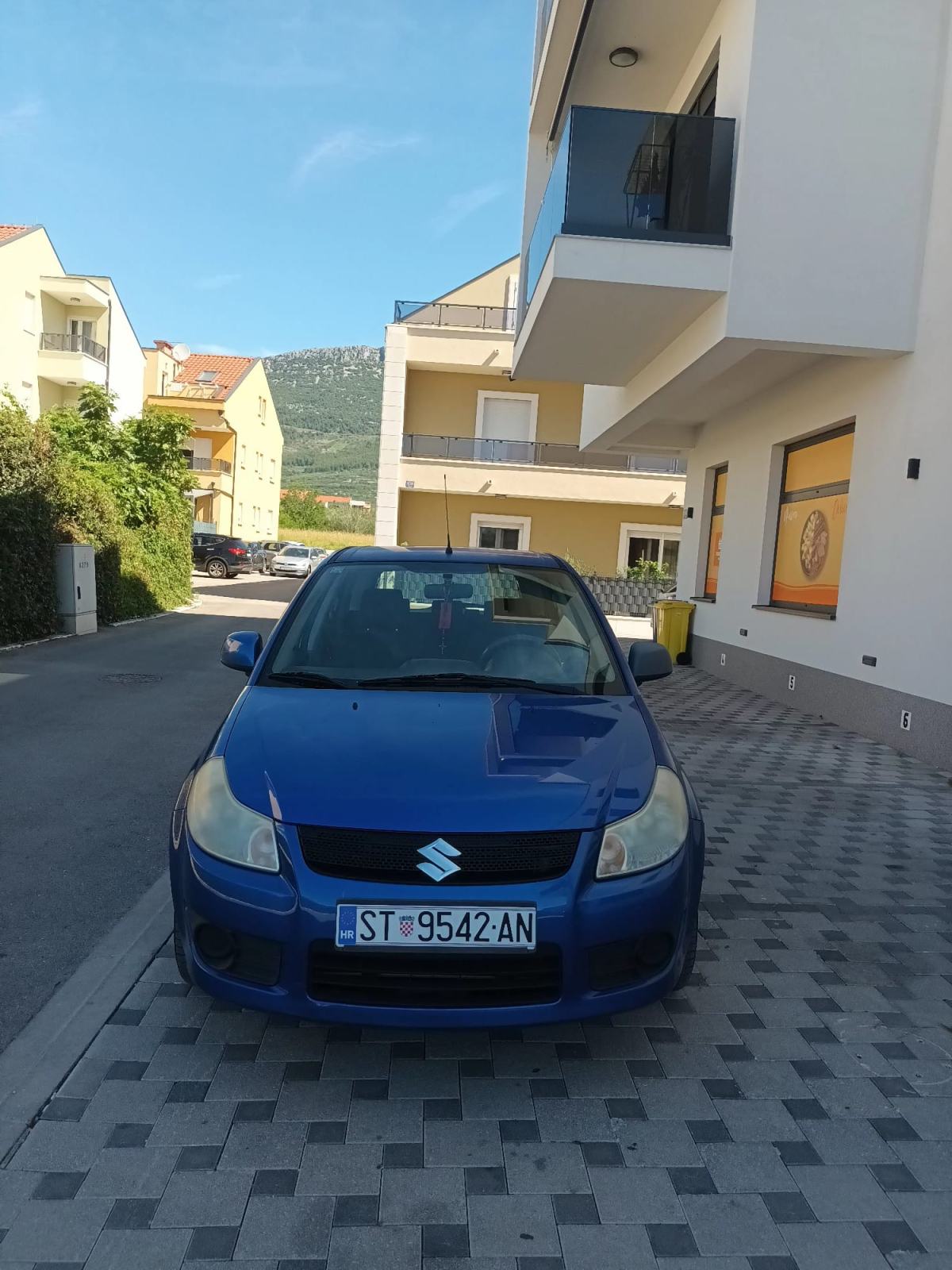 Suzuki SX4 1,5 GC, fotografija 7