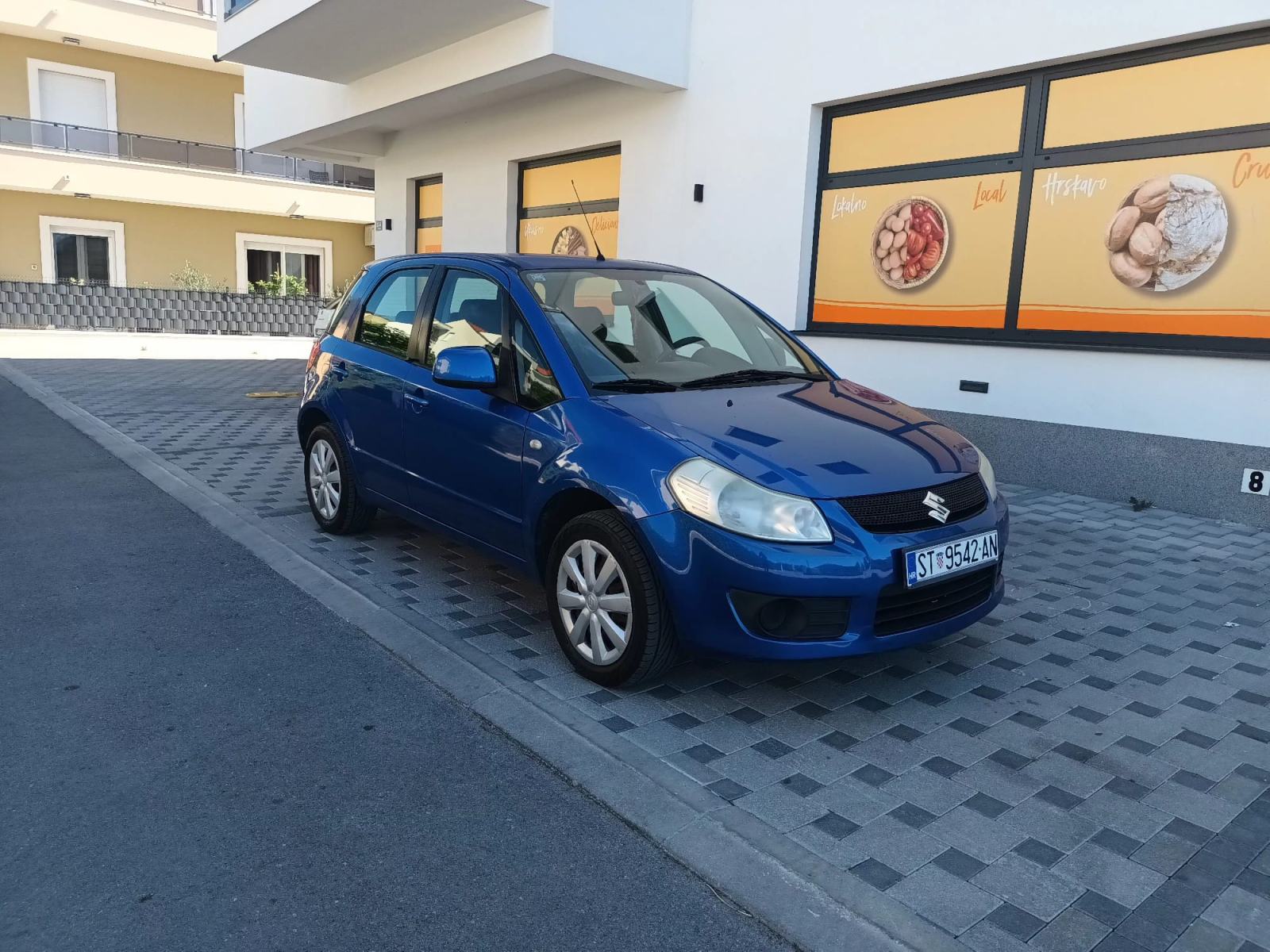 Suzuki SX4 1,5 GC, fotografija 9