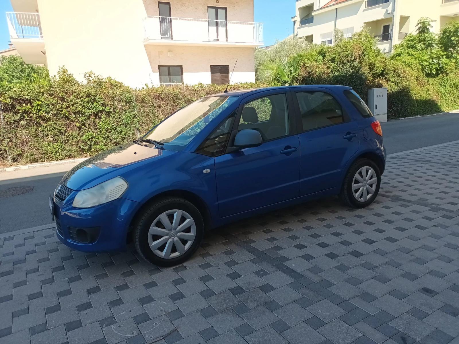 Suzuki SX4 1,5 GC, fotografija 11