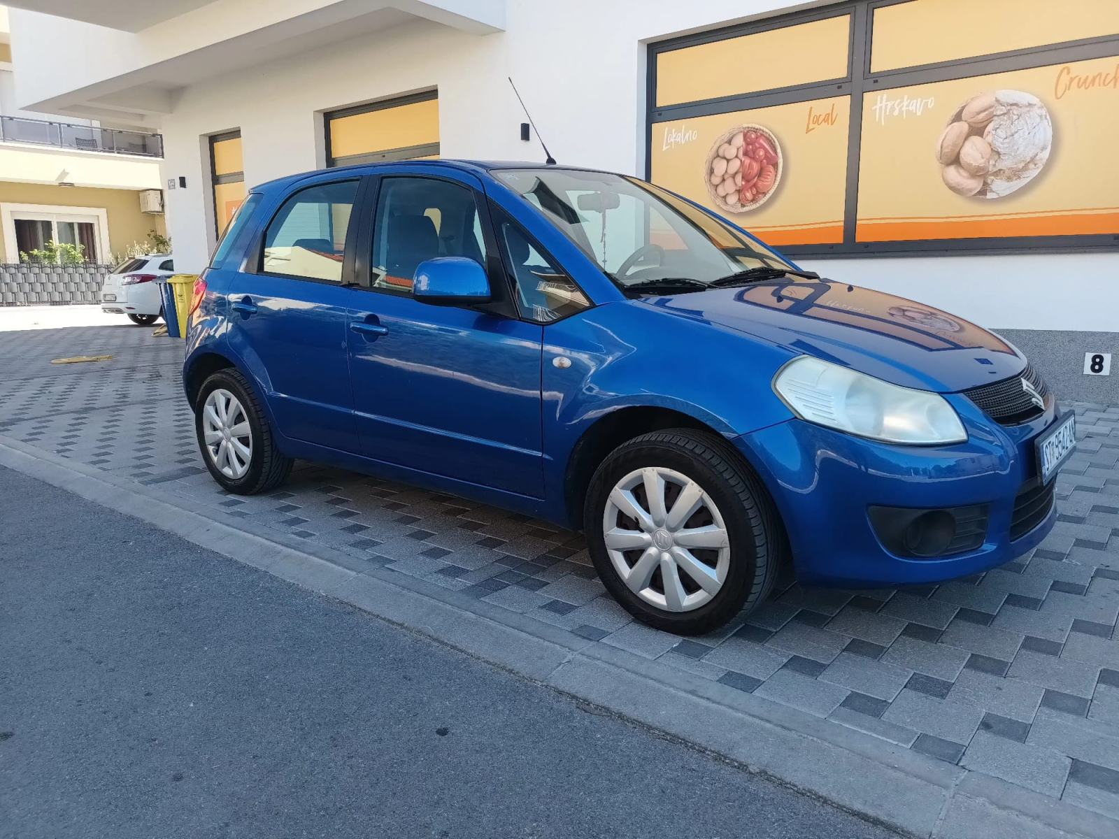 Suzuki SX4 1,5 GC, fotografija 13