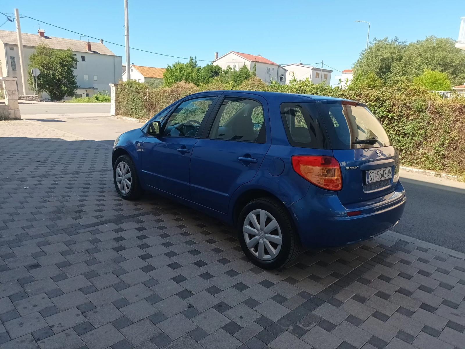 Suzuki SX4 1,5 GC, fotografija 15