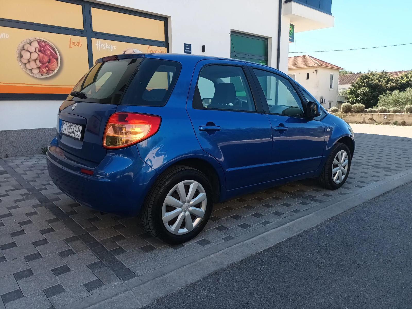 Suzuki SX4 1,5 GC, fotografija 16