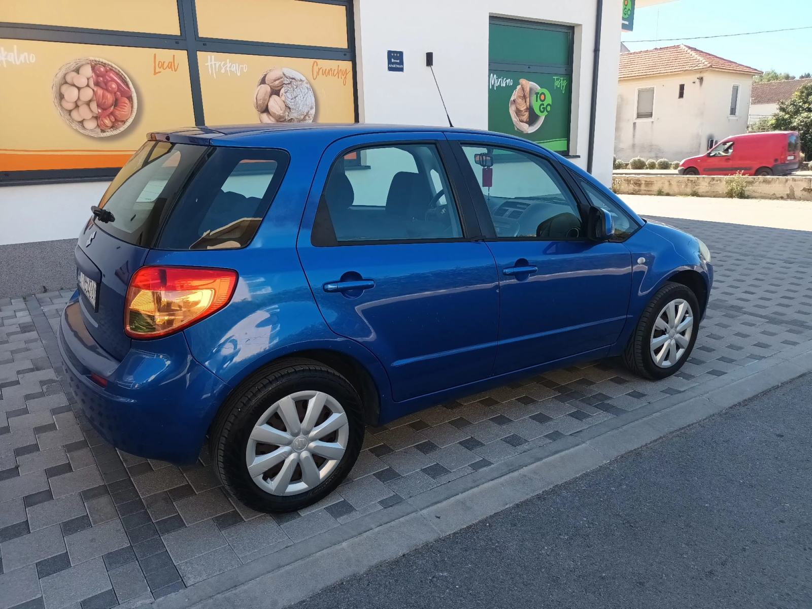 Suzuki SX4 1,5 GC, fotografija 17