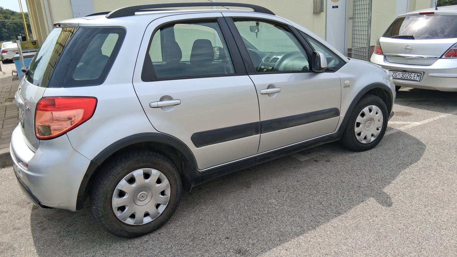 Suzuki SX4 2,0diesel--atest.kuka,klima,2 ključ..2011g..1750eur, pogled izvana - slika 1