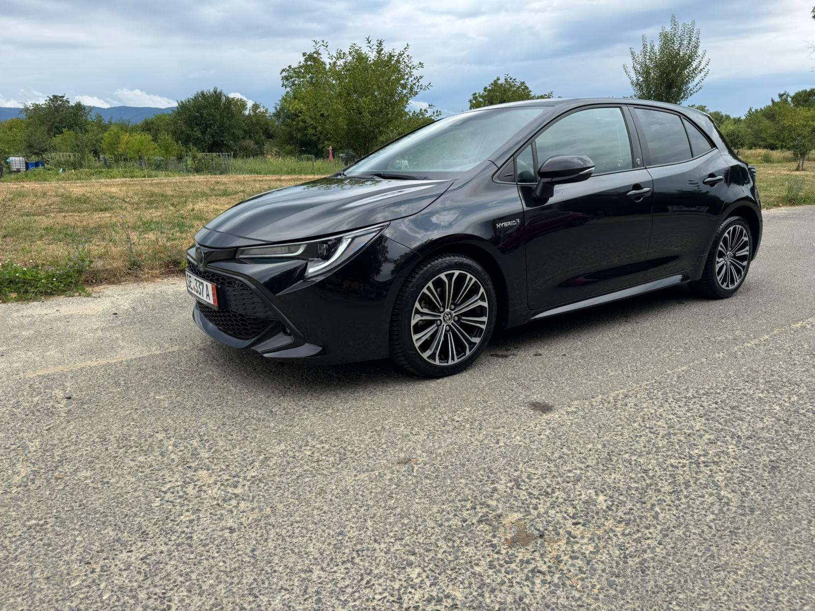 Toyota Corolla hybrid , team deutschland , 34.000km, top stanje, fotografija 9