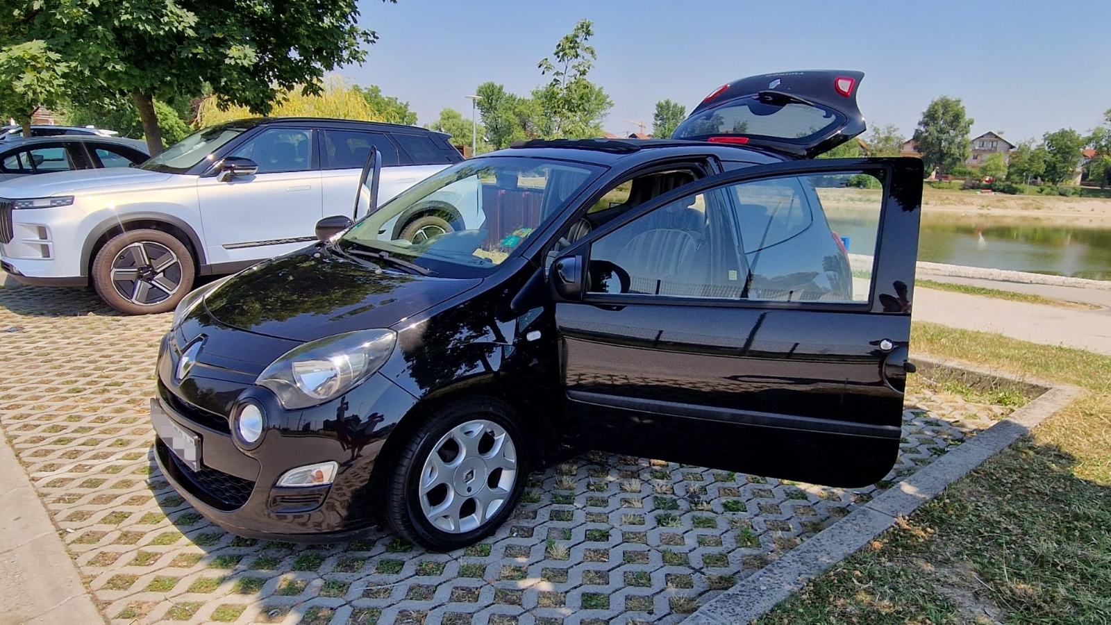 Twingo 1,2 16V pomicni krov,1 VLASNIK:LJETNA RASPRODAJA SAMO 3950 EURA, fotografija 12