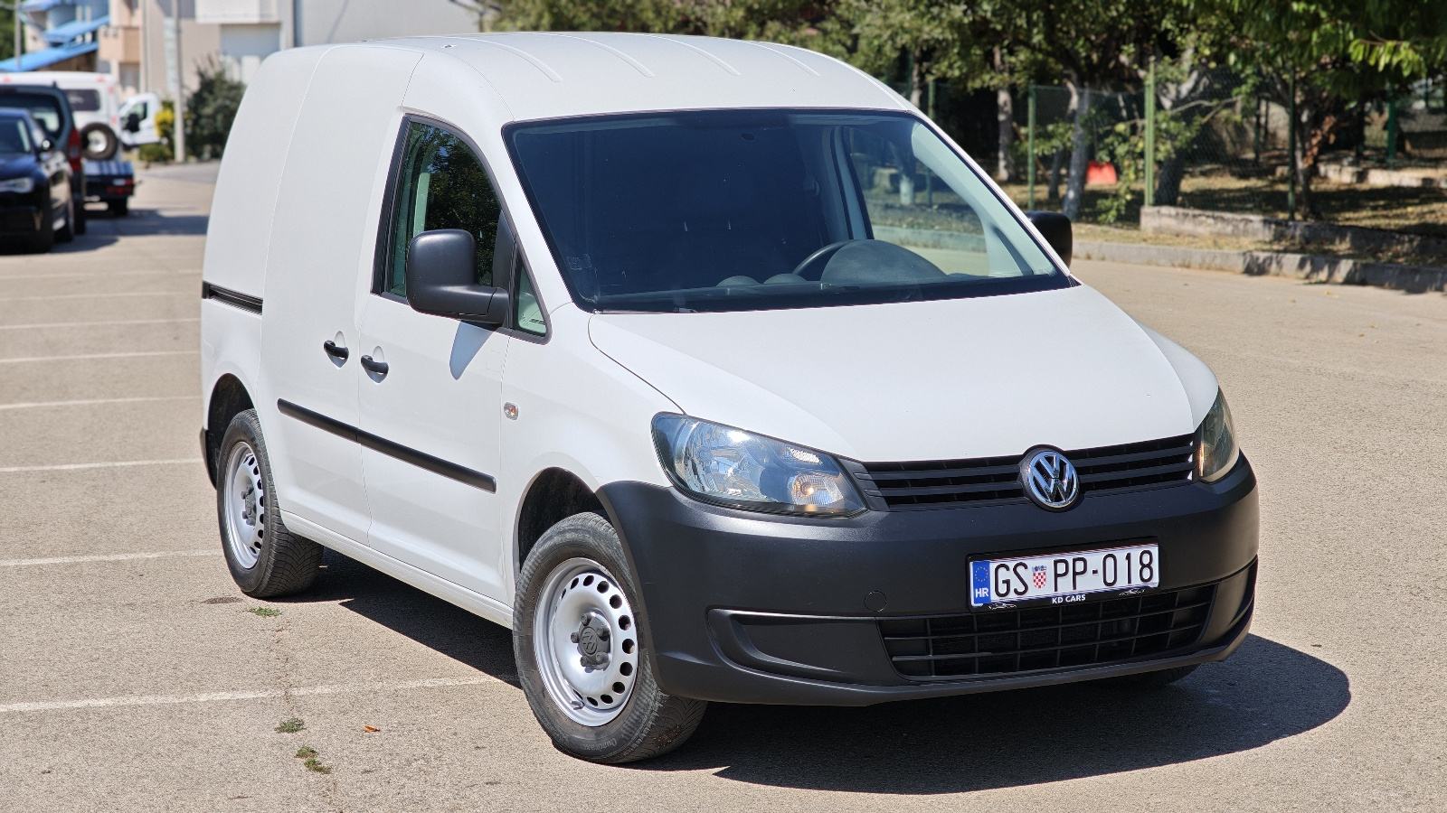 VW Caddy 1,6 TDI • 102KS • 2014 •, fotografija 1