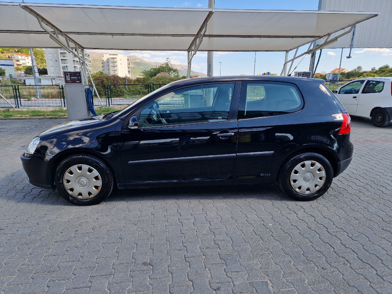 VW Golf 5 1,6, fotografija 1