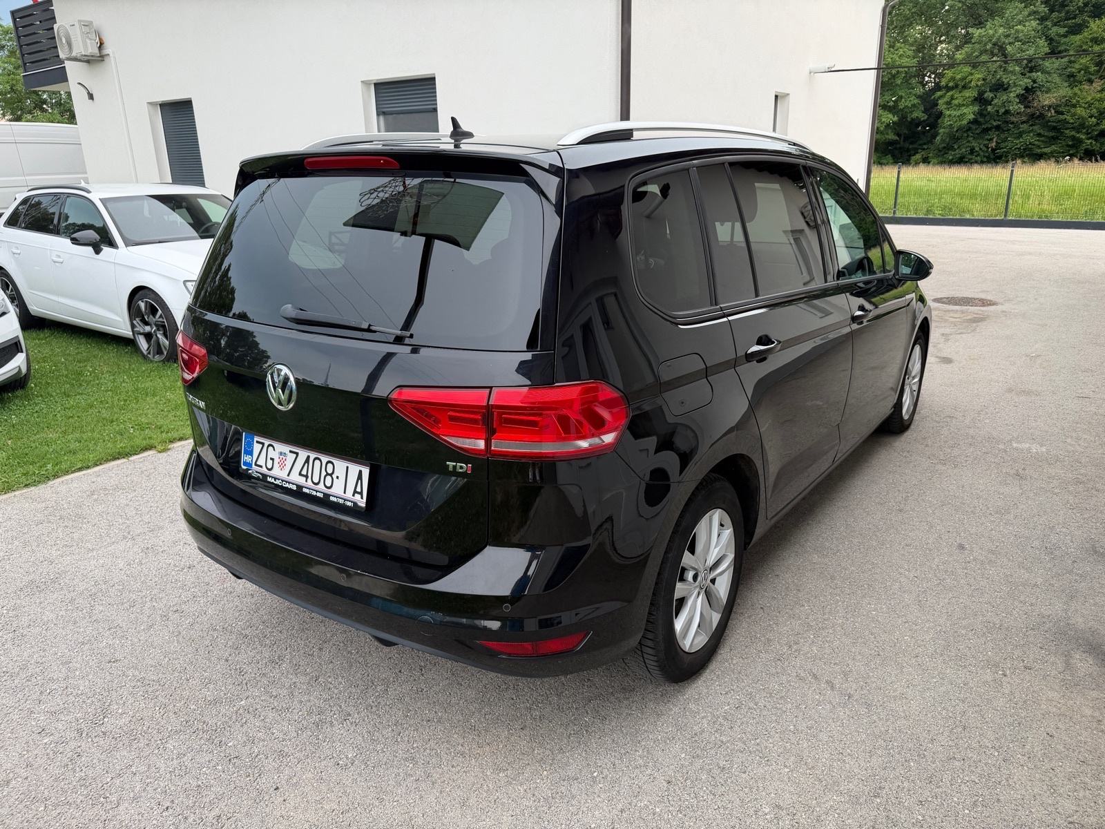VW Touran 1,6 TDI DSG, 7 sjedala, fotografija 4