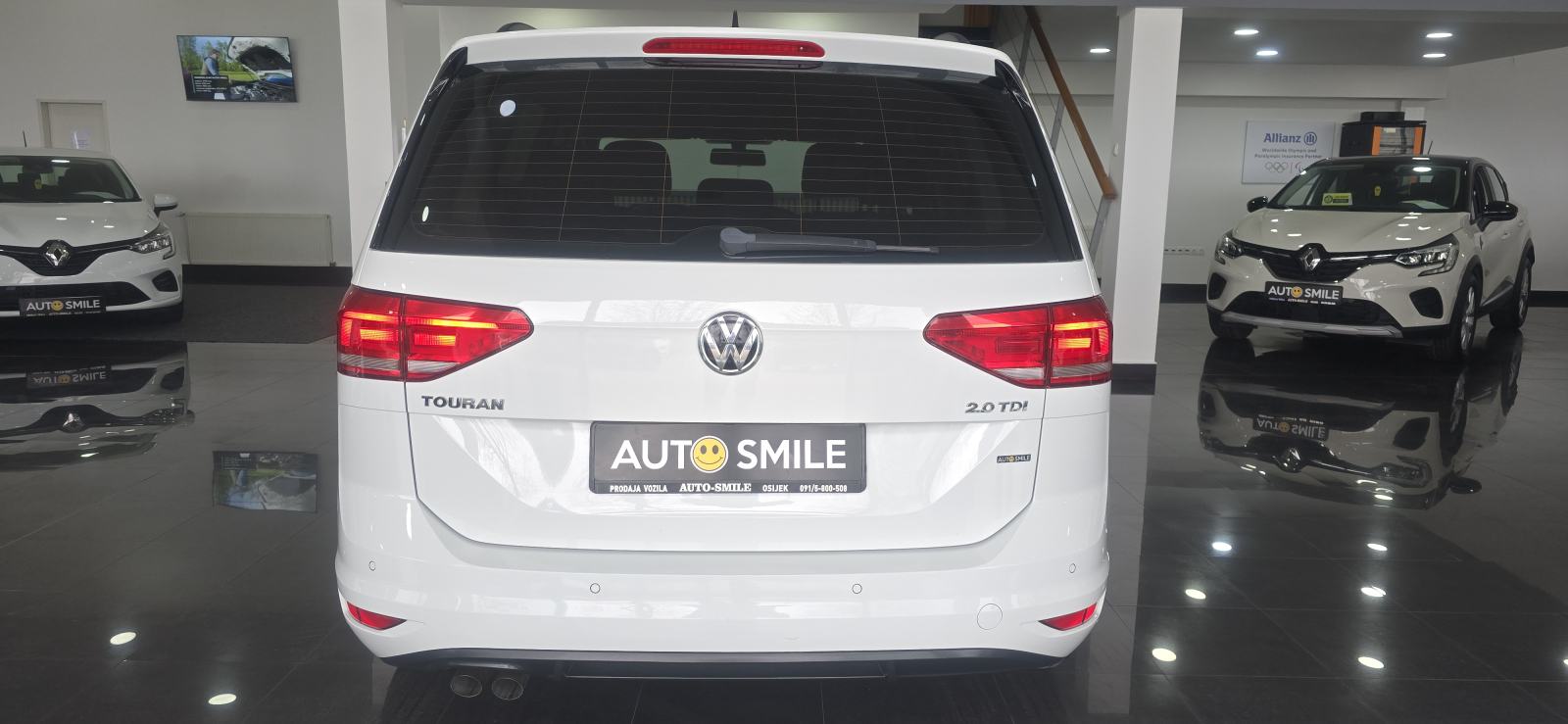 VW Touran 2,0 TDI, NAVI, TEMP, AUT.KLIMA, PDC, ALU,JAMSTVO,REG. 4/27, fotografija 7