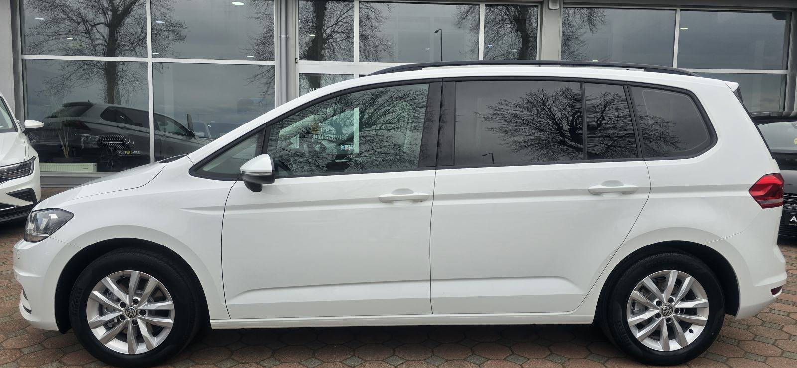 VW Touran 2,0 TDI, NAVI, TEMP, AUT.KLIMA, PDC, ALU,JAMSTVO,REG. 4/27, fotografija 4
